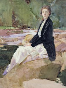 Jeune femme assise sur des rochers